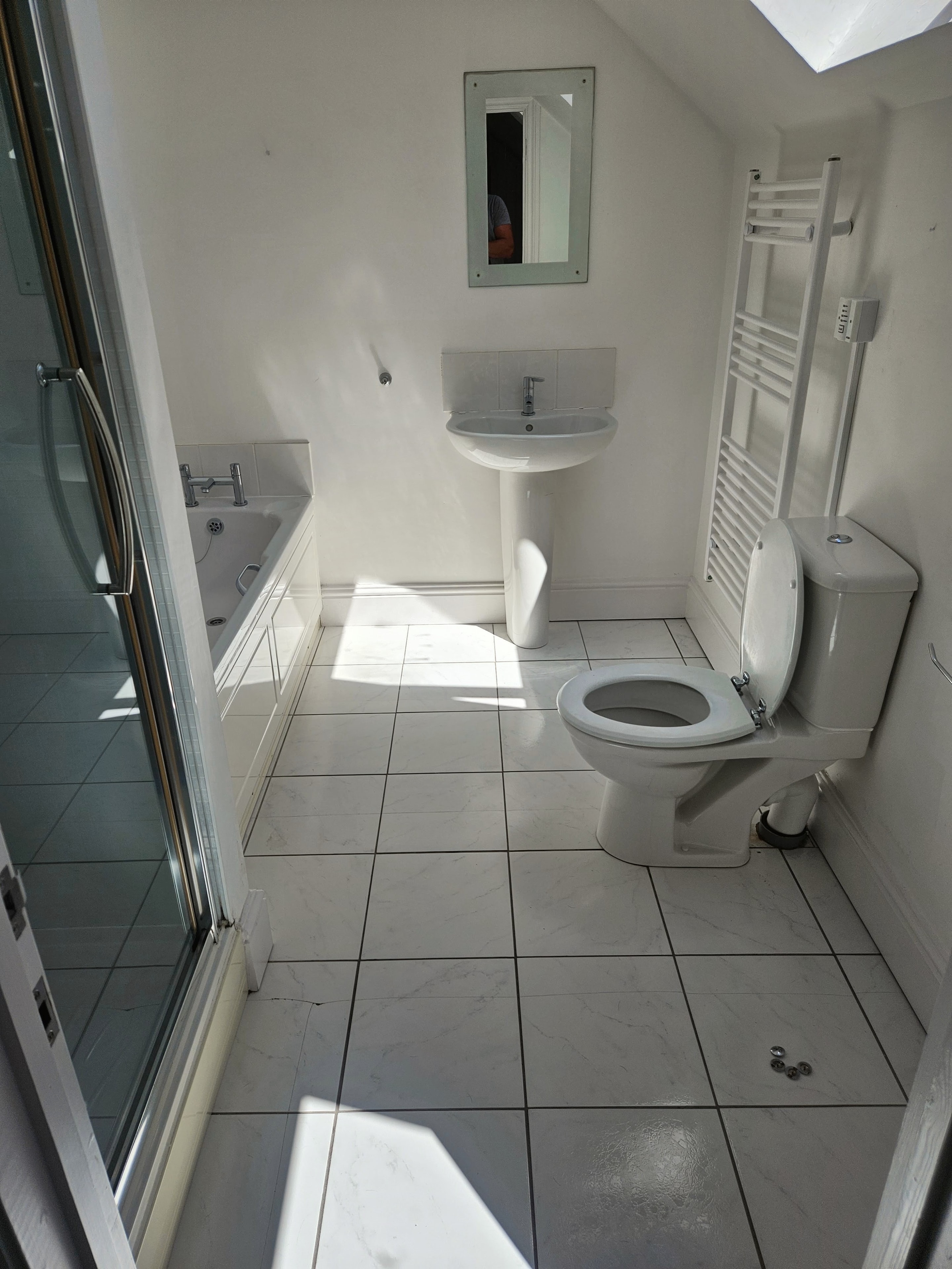 Bathroom in Anglesey before reconditioning by ARK Plumbing