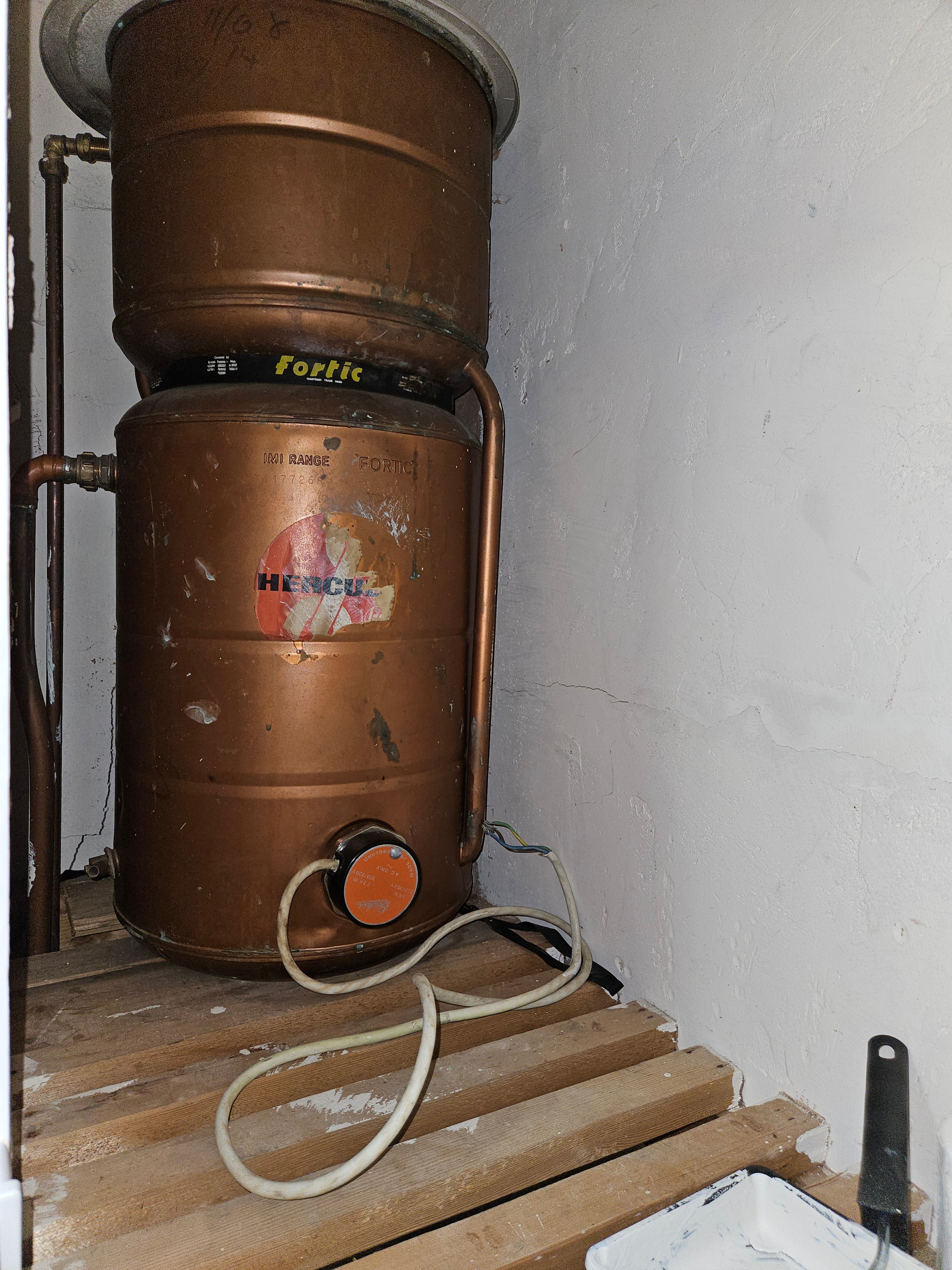 Old copper Fortic tank before the plumbing upgrade