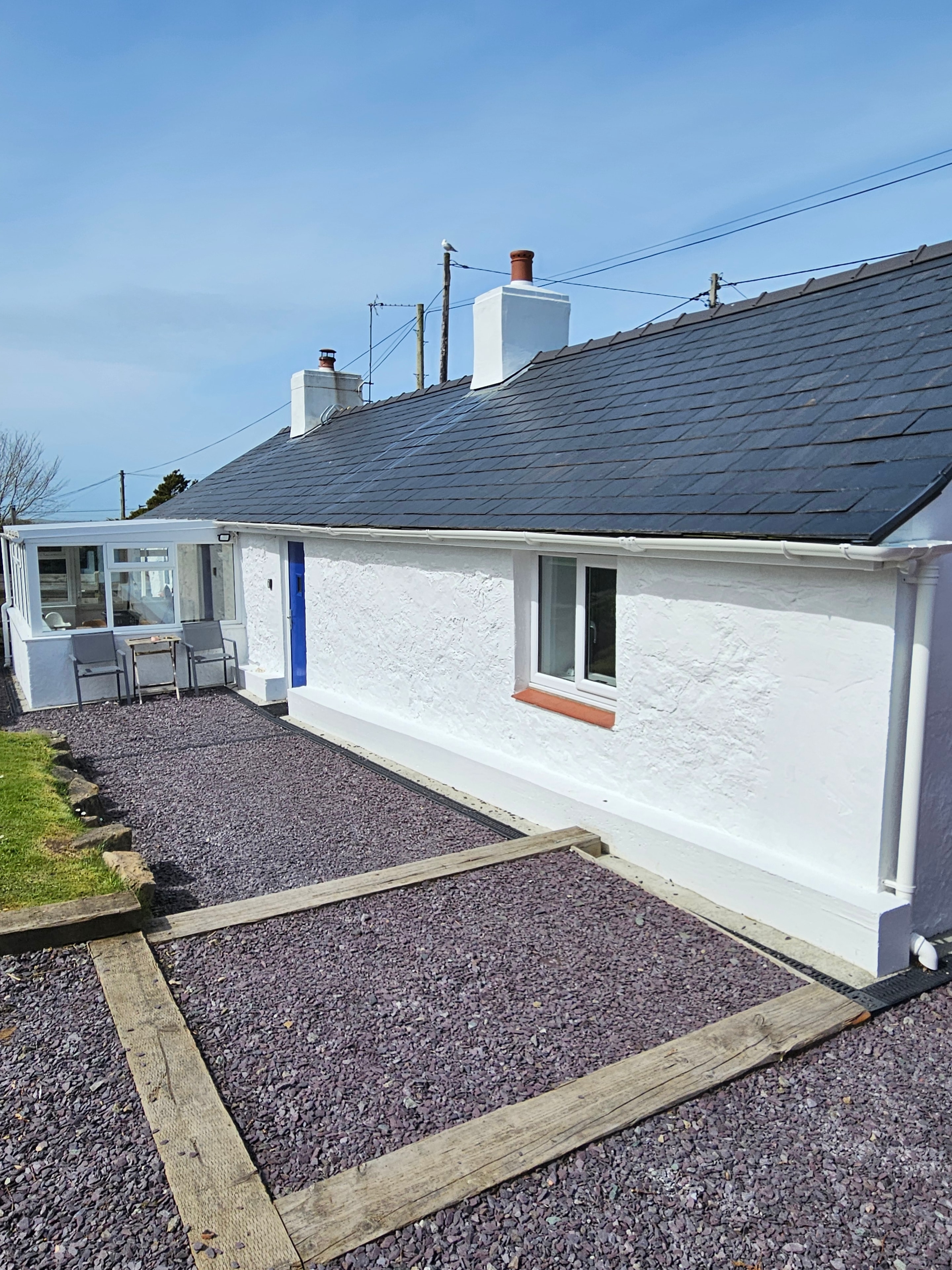 Repainted cottage exterior in Hermon, Anglesey — third view